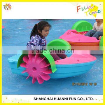 kids hand paddle boat with inflatable swimming pool
