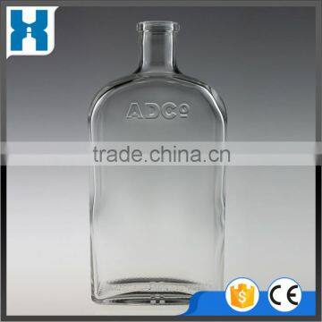 EMPTY 700ML EMBOSSED GLASS FLAT LIQUOR BOTTLE