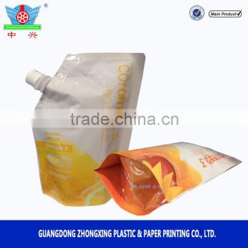 Plastic packaging pouch with spout for juice