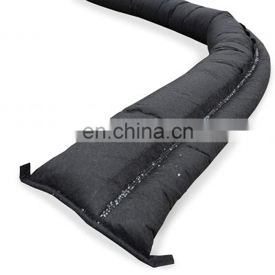 Quick dam black water-activated filled sandbag bag garage flood barrier