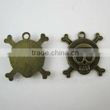 Antique bronze skull charm pendant