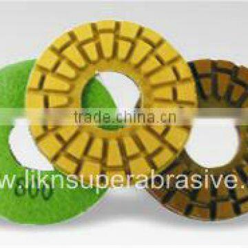 Wet polishing pads with QRS