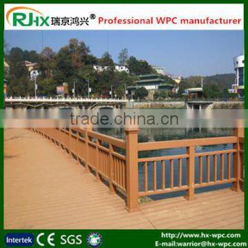 Wall cladding with wood plastic composite fence for temporary wood fencing