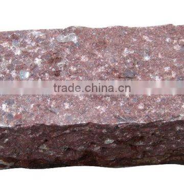 Pineapple finished red porphyry kerb stone