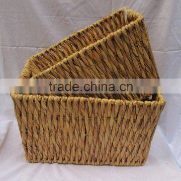 Water hyacinth storage basket with iron frame and handle