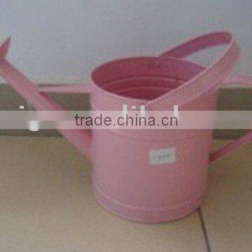 garden pink metal watering can
