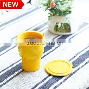 Hot sale color glazed ceramic cup with silicone sleeve and tea infuser