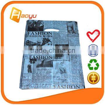 China supplier promotional die cut handle plastic packaging bag                        
                                                Quality Choice