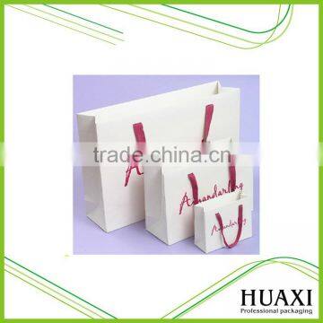 Customized size ribbon/ pp rope high quality fancy paper gift bag