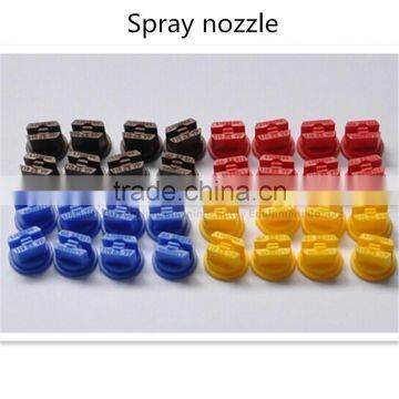 Low pressure plastic unijet spray nozzle