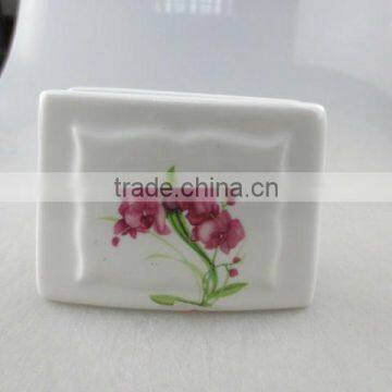 square porcelain napkin holder with flower design