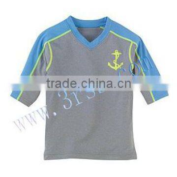 young boy's rash guard with V neck in grey