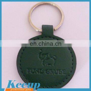 chinese promotional gifts custom embossed logo round leather key chain wholesale