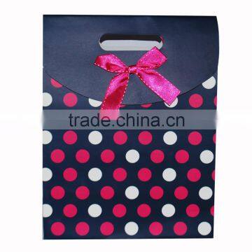 2017 newly design custom printed paper gift shopping bag /packing bag one dollar sale