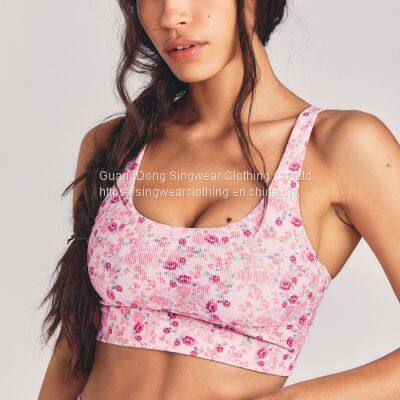 Ladies' santoni seamless knit quick dry & wicking cross back mid support sports bra.