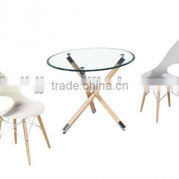 Plastic Chair and glass table with wooden cross legs