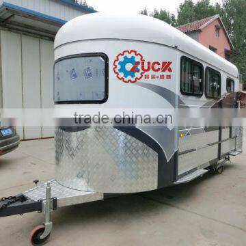 Deluxe 2 horse float with front sofa/bed, side kitchen, shower room