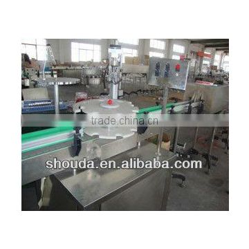 Syrup bottle crimping cap machine