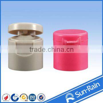 Plastic flip top bottle cap
