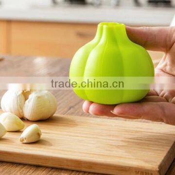 Cy287 New Creative Silicone Garlic Peeler Kitchen Gadget Roller Tool Kitchen Accessory Tool photo-4