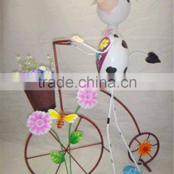 Special iron cow ride the bike planter for garden decor