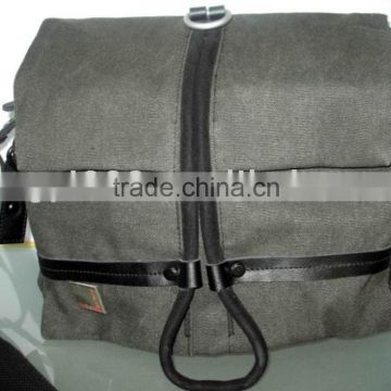 Digital camera bag be made of canvas with real leather