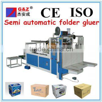 Corrugated box folding gluing machine