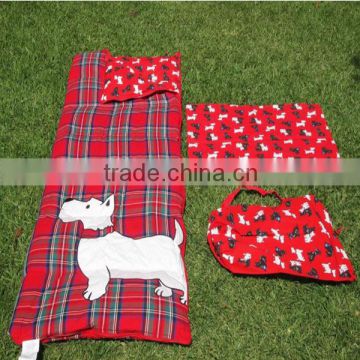 Outdoor red children's sleeping bag with dog patterns