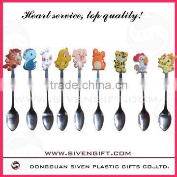 cute spoon for kids made of pvc cover and stainless steel