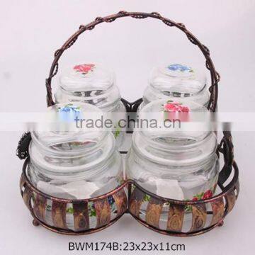 4pcs glass jar with flower decal on a metal stand