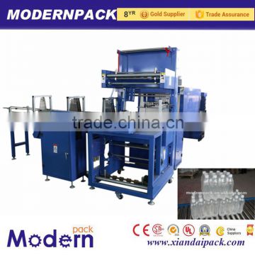 Automatic shrink film packaging machine