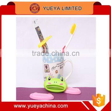 lovely cartoon toothpaste squeezer Dispenser Rolling Holder tools