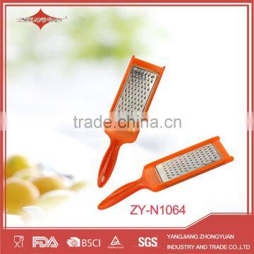 orange stainless steel kitchen mircroplane zester grater