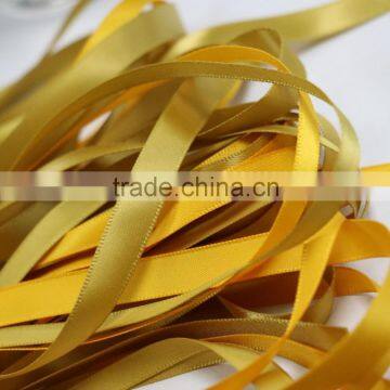 golden pre-tied ribbons and bow with elastic stretch loops