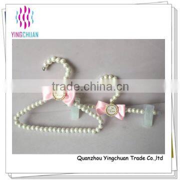 Plastic bead baby child clothing hanger