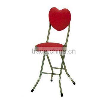 Red heart-shaped metal folding chair