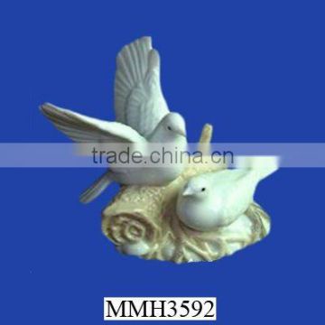 Exceptional white porcelain pigeon sculpture