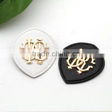 Black/white PU Leather Sew on Patches Fashion Labels With Metal Logo Clothing Label for Jeans/jacket PLB-001 photo-3