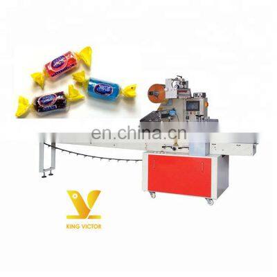 automatic wrapping single candy small biscuit packaging machine China