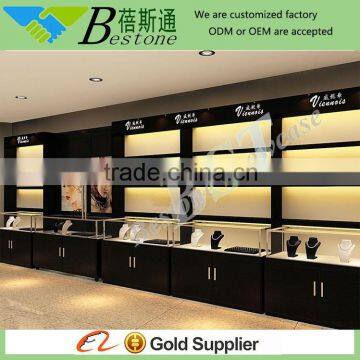 high end beauty dark wood retail store furniture displays for jewelry