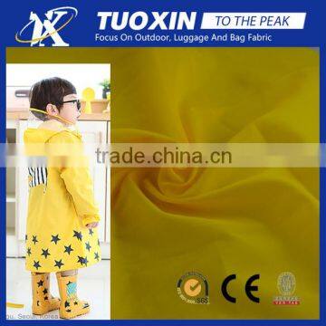 210T ripstop polyester waterproof child raincoat fabric soft smooth tough material