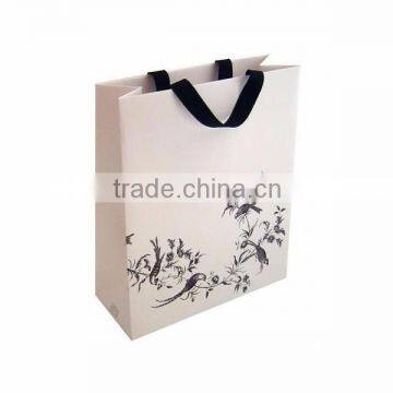 Portable white packaging art paper custom funny paper bag