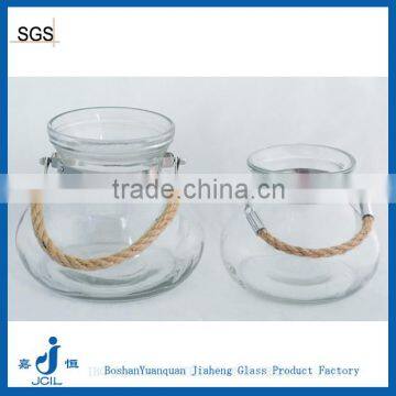 Clear or color glass candle jars with pack thread handle