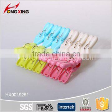 12pcs V design assorted plastic color clothes clips pegs                        
                                                                                Supplier's Choice