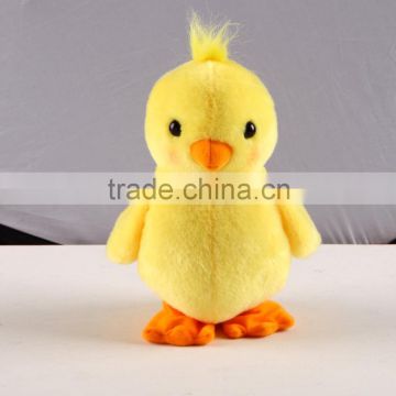 yellow walking and flapping chick