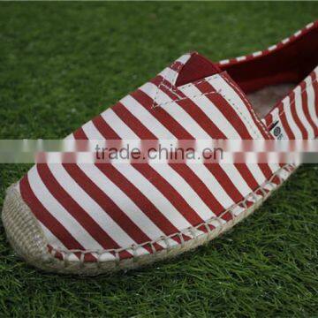 The red stripe stock canvas shoes