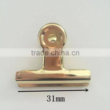 gold spring binder clip