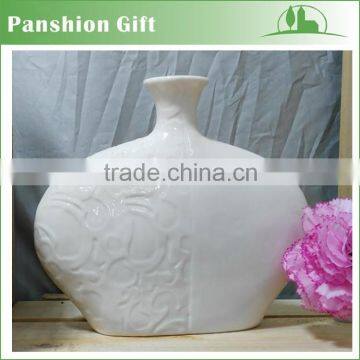 white ceramic unique shape flower vase