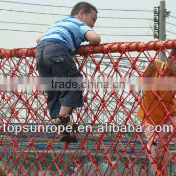 Children climbing nets