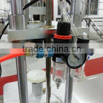 2015 JF XG-Q Pneumatic Perfume Bottle Spray Cap Crimping Machine photo-2